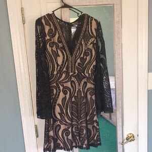 Elegant Black and Gold Lace Dress